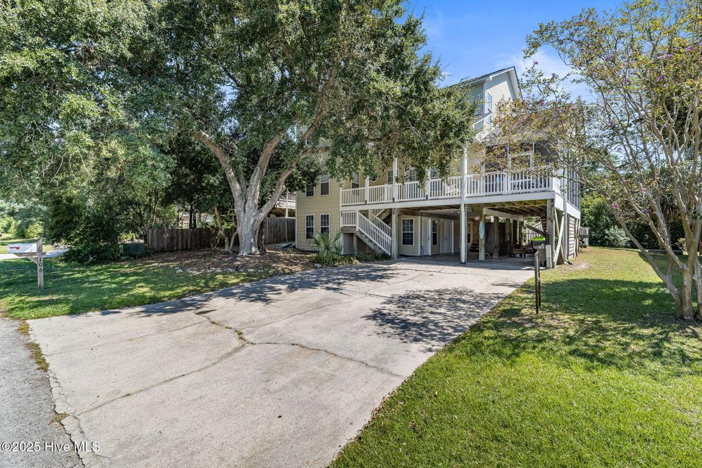 Photo of 106 SE 44th Street, Oak Island, NC 28465 (MLS # 100530041)