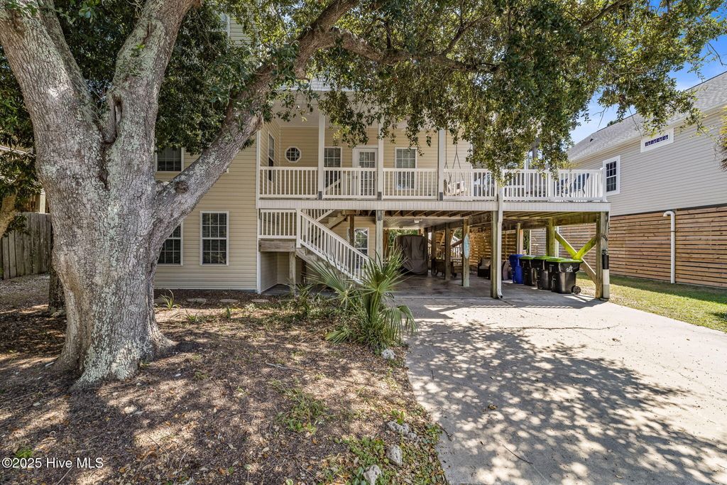 Photo of 106 SE 44th Street, Oak Island, NC 28465 (MLS # 100530041)