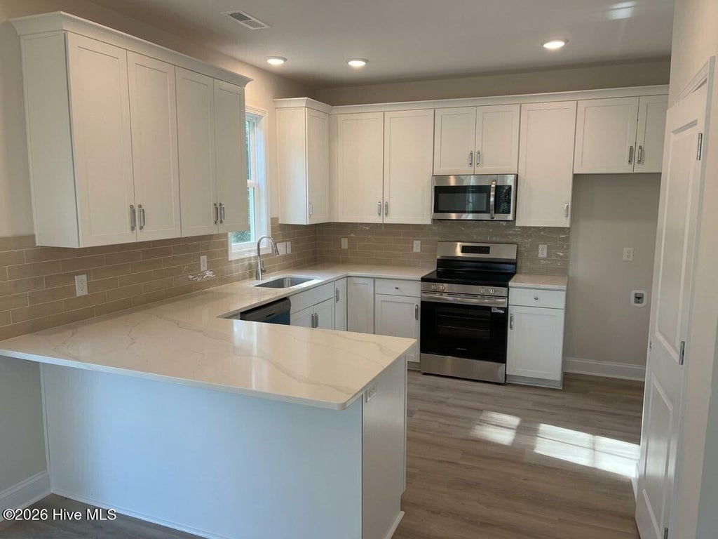 Photo of 228 S Bandwheel Way, Hampstead, NC 28443 (MLS # 100576237)