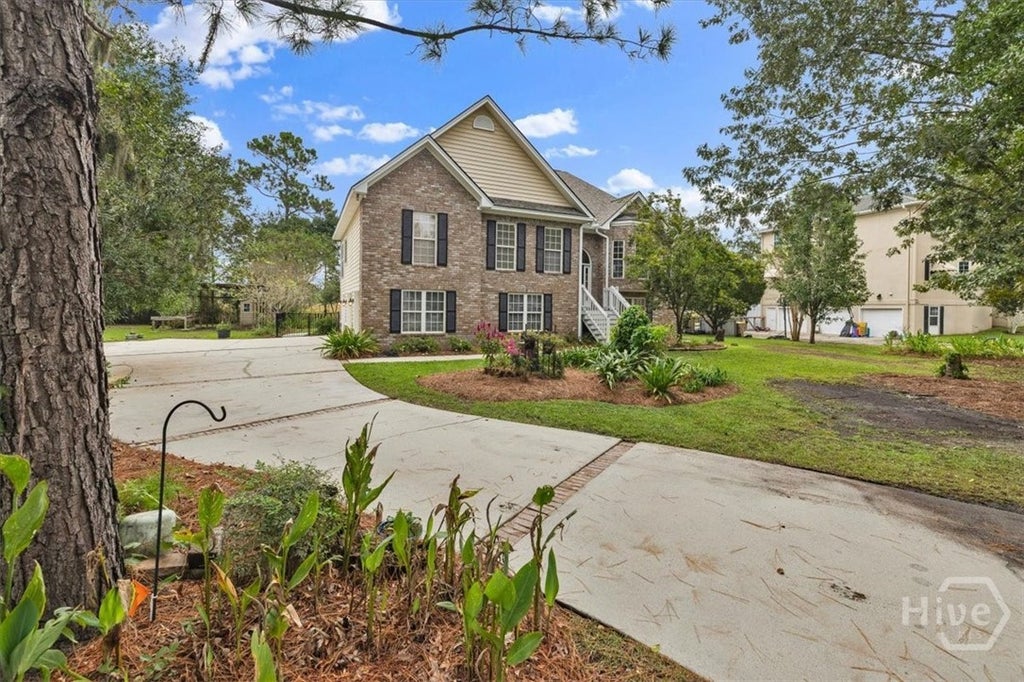 Photo of 187 Sterling Woods Drive, Richmond Hill, GA 31324 (MLS # SA362651)