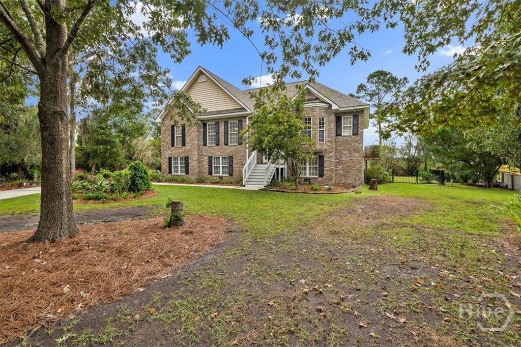 Photo of 187 Sterling Woods Drive, Richmond Hill, GA 31324 (MLS # SA362651)