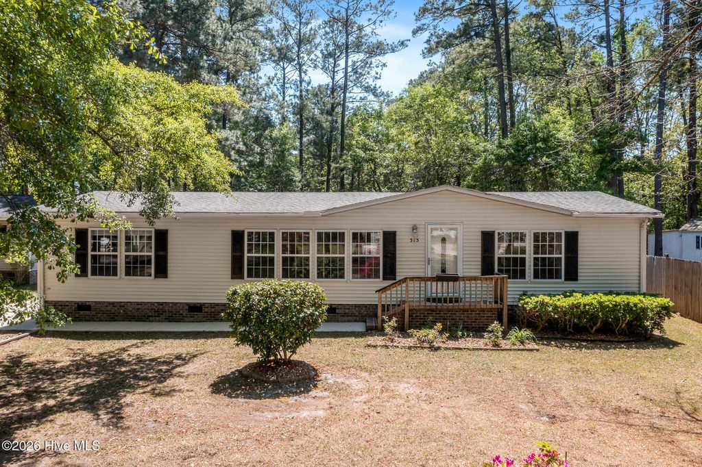 Photo of 313 Ocean Forest Drive NW, Calabash, NC 28467 (MLS # 100567029)