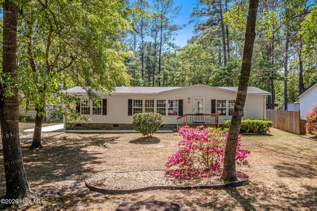 Photo of 313 Ocean Forest Drive NW, Calabash, NC 28467 (MLS # 100567029)