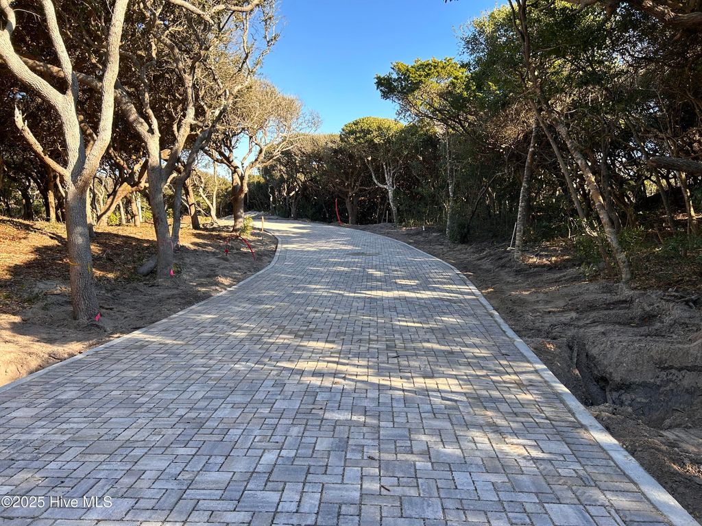 Photo of 107 Roosevelt Reserve Park Place Dr, Pine Knoll Shores, NC 28512 (MLS # 100545363)