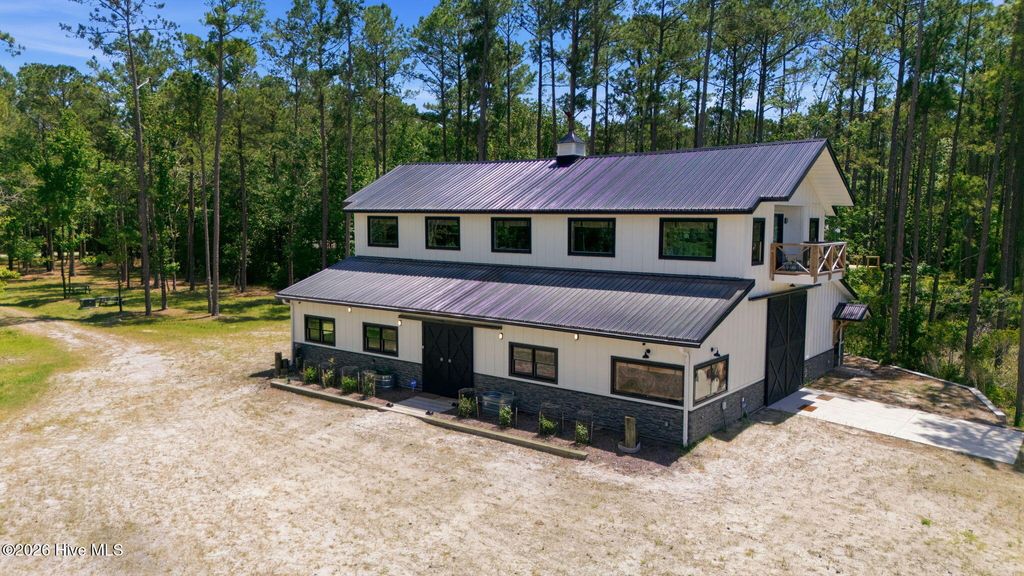 Photo of 407 Point Of View Drive, Merritt, NC 28556 (MLS # 100576315)