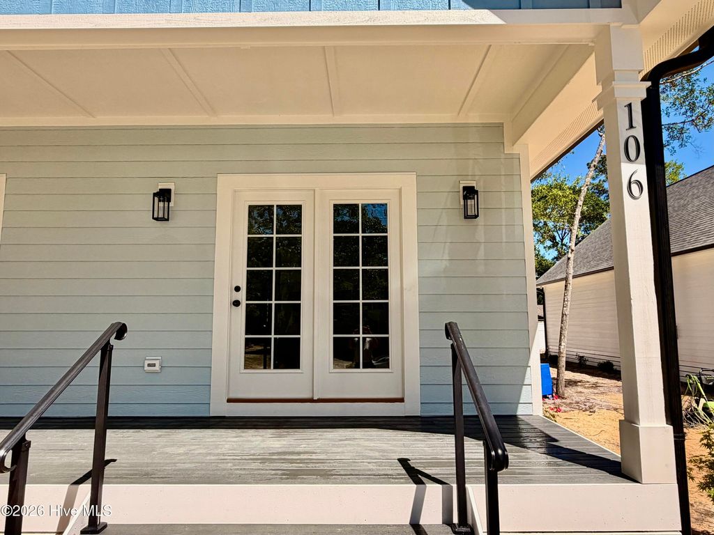 Photo of 106 NW 23rd Street, Oak Island, NC 28465 (MLS # 100576164)