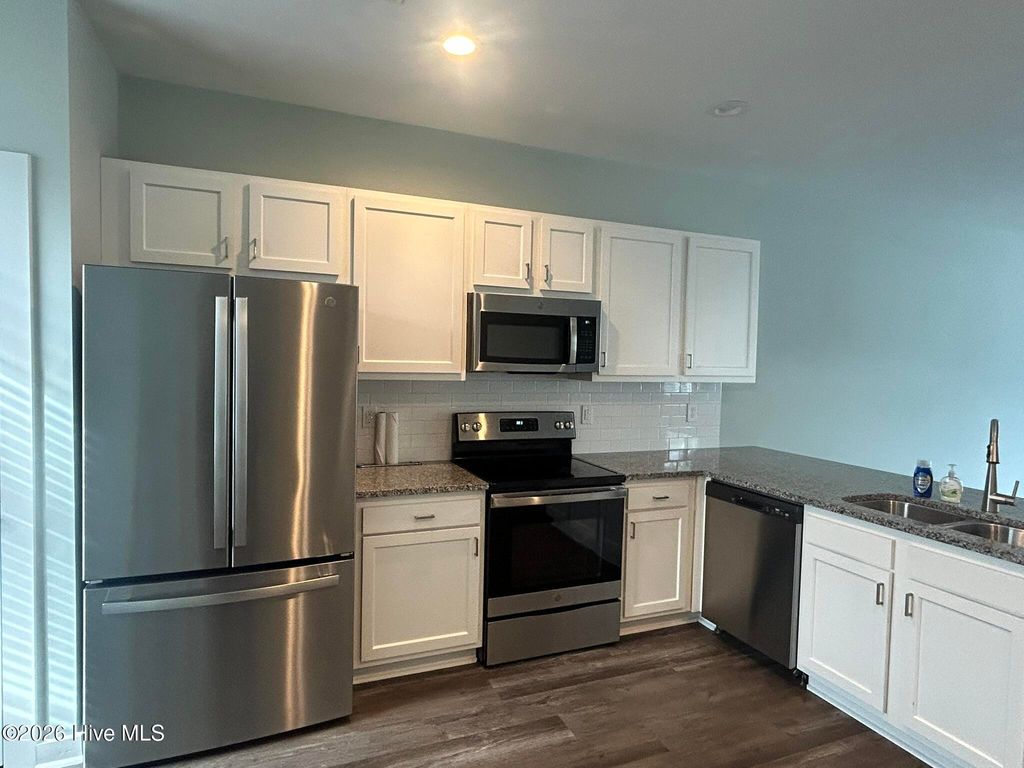 Photo of 611 Windsurfing Lane, Sneads Ferry, NC 28460 (MLS # 100560015)