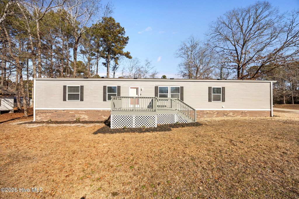 Photo of 410 Fawn Drive, Hampstead, NC 28443 (MLS # 100551918)