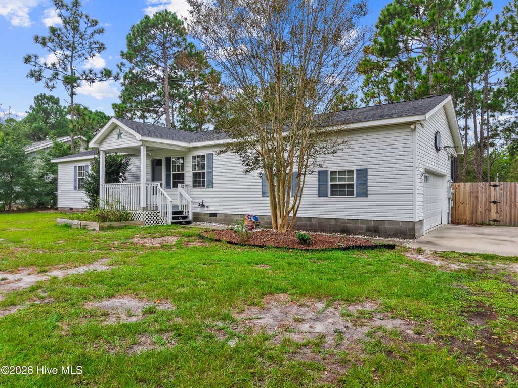 Photo of 2311 E Boiling Spring Road, Southport, NC 28461 (MLS # 100606996)