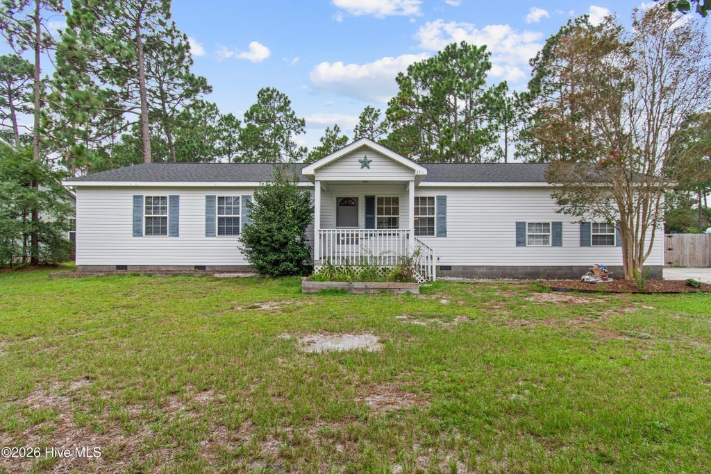Photo of 2311 E Boiling Spring Road, Southport, NC 28461 (MLS # 100606996)