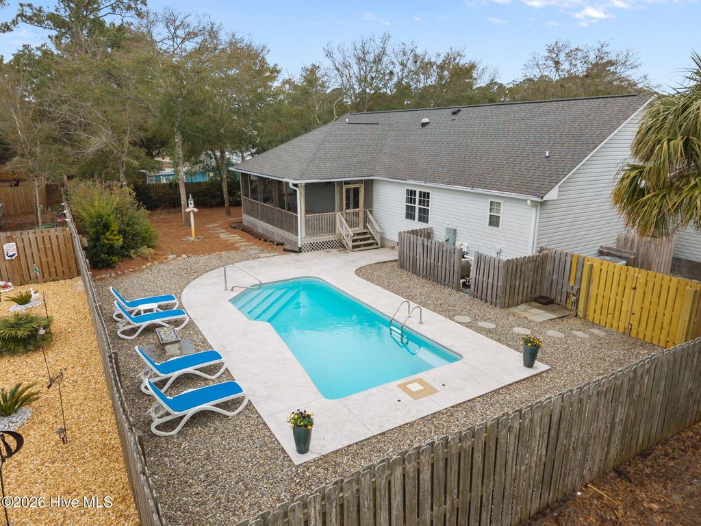 Photo of 108 NW 26th Street, Oak Island, NC 28465 (MLS # 100555796)