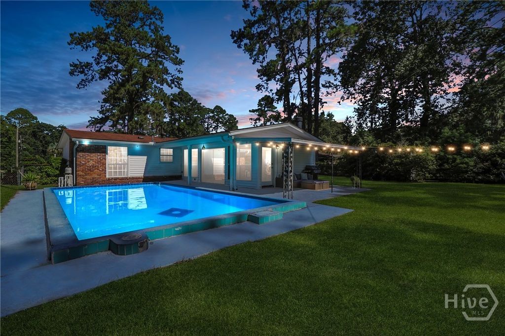 Photo of 12726 Golf Club Drive, Savannah, GA 31419 (MLS # SA336437)