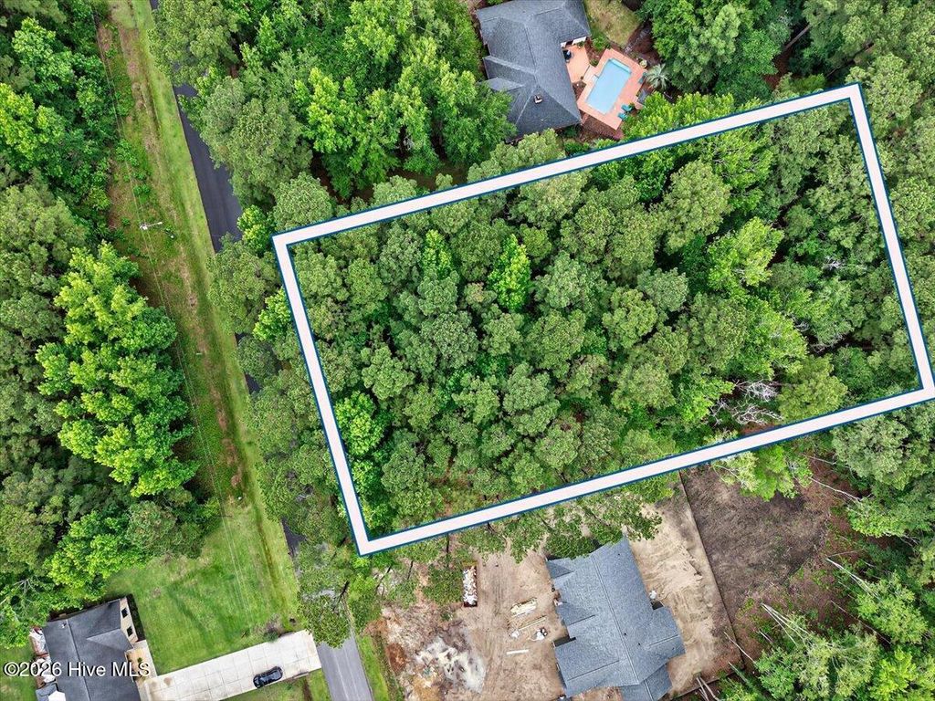 Photo of 43 Sunfield Drive, Carolina Shores, NC 28467 (MLS # 100553650)