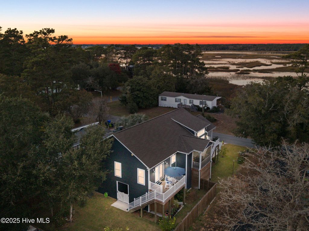 Photo of 7605 E Yacht Drive NE, Oak Island, NC 28465 (MLS # 100541754)