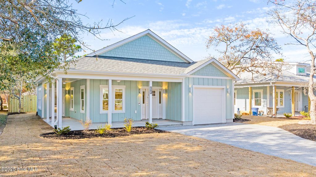 Photo of 163 NW 4th Street, Oak Island, NC 28465 (MLS # 100514744)