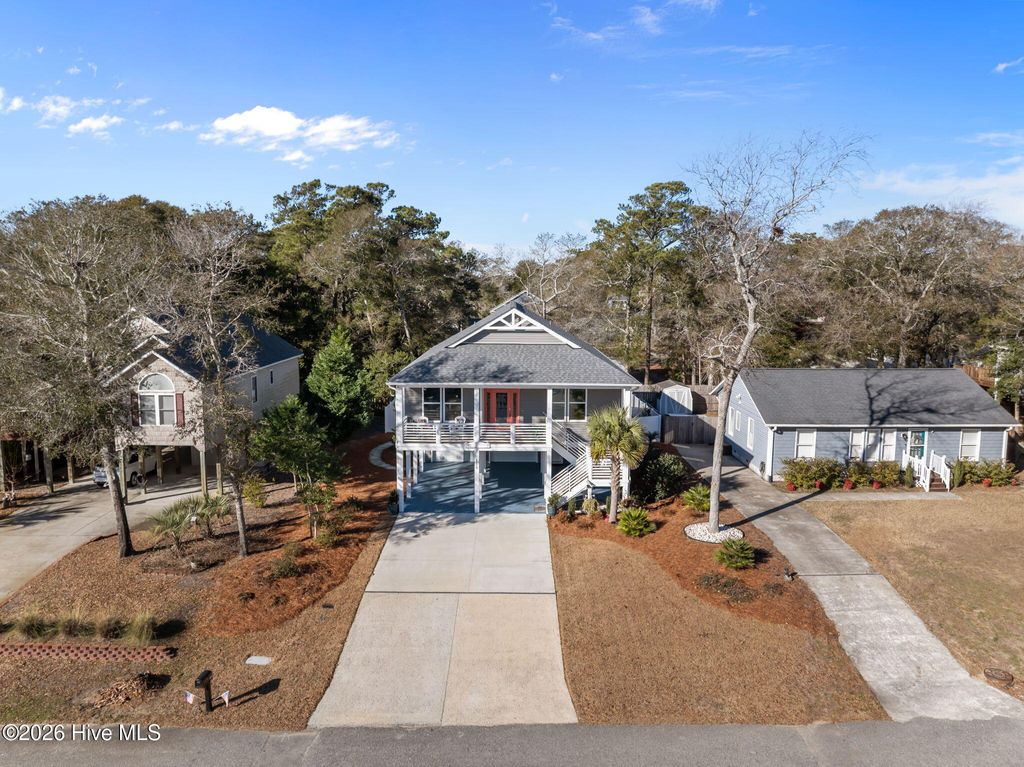 Photo of 115 SE 12th Street, Oak Island, NC 28465 (MLS # 100546966)