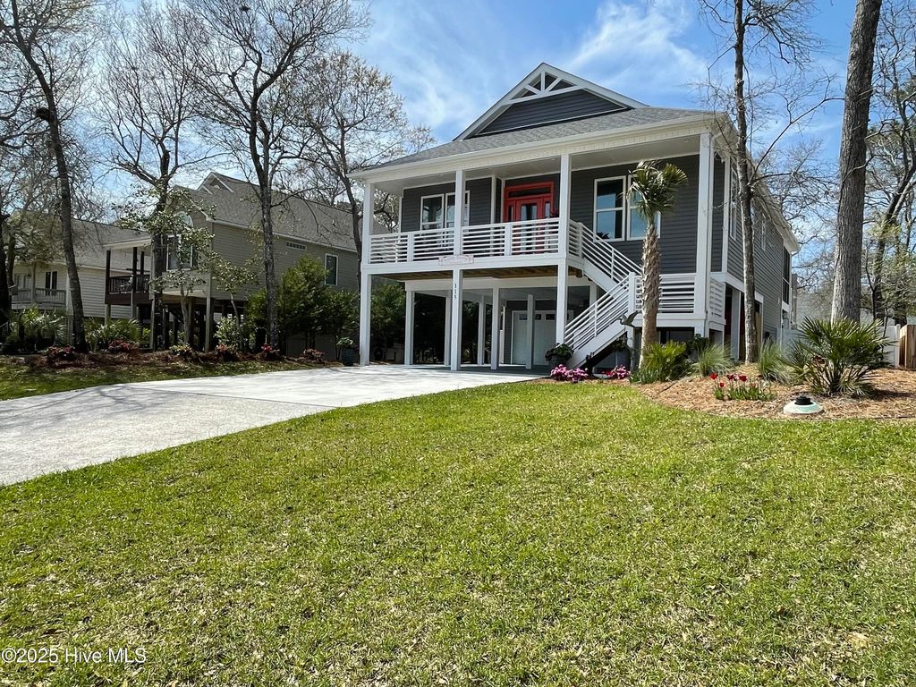 Photo of 115 SE 12th Street, Oak Island, NC 28465 (MLS # 100546966)