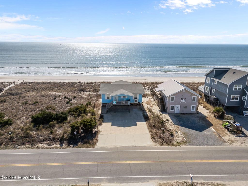 Photo of 1011 W Beach Drive, Oak Island, NC 28465 (MLS # 100550375)