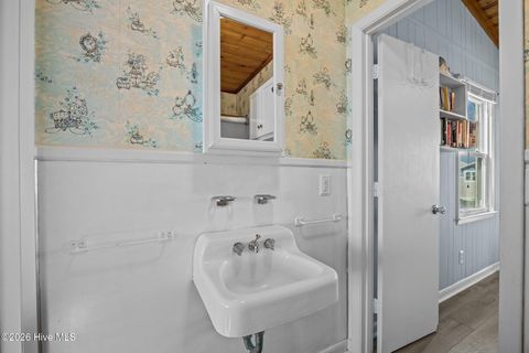 Tiny photo for 1011 W Beach Drive, Oak Island, NC 28465 (MLS # 100550375)