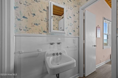 Tiny photo for 1011 W Beach Drive, Oak Island, NC 28465 (MLS # 100550375)