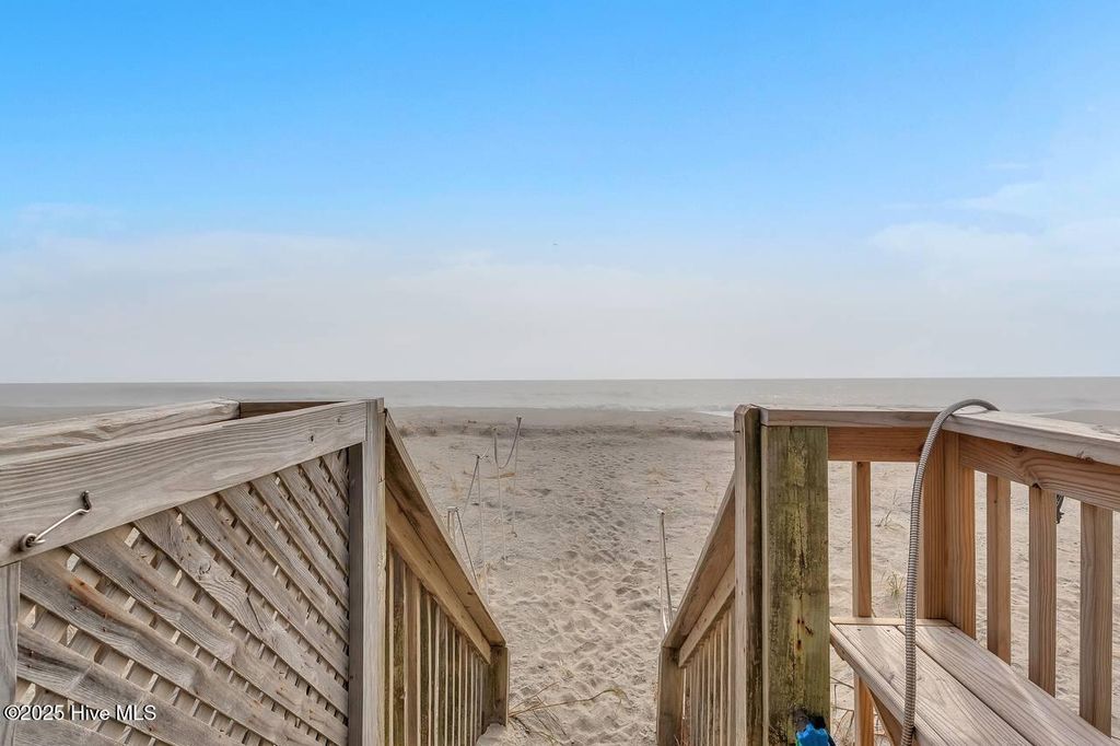 Photo of 1011 W Beach Drive, Oak Island, NC 28465 (MLS # 100550375)