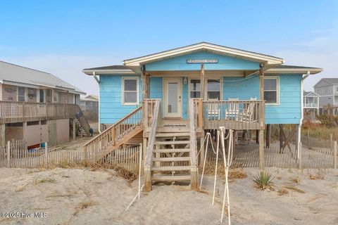Photo of 1011 W Beach Drive, Oak Island, NC 28465 (MLS # 100550375)