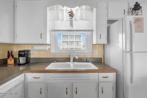 Tiny photo for 1011 W Beach Drive, Oak Island, NC 28465 (MLS # 100550375)