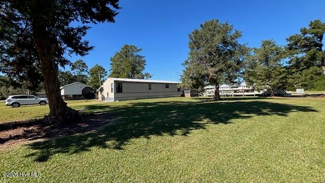 Photo of 1080 Paradise Shores Road, Merritt, NC 28556 (MLS # 100612594)