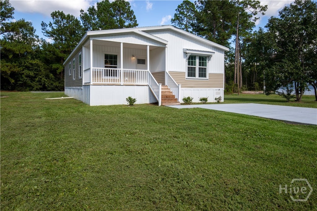 Photo of 660 N Macon Street, Ludowici, GA 31313 (MLS # SA365044)