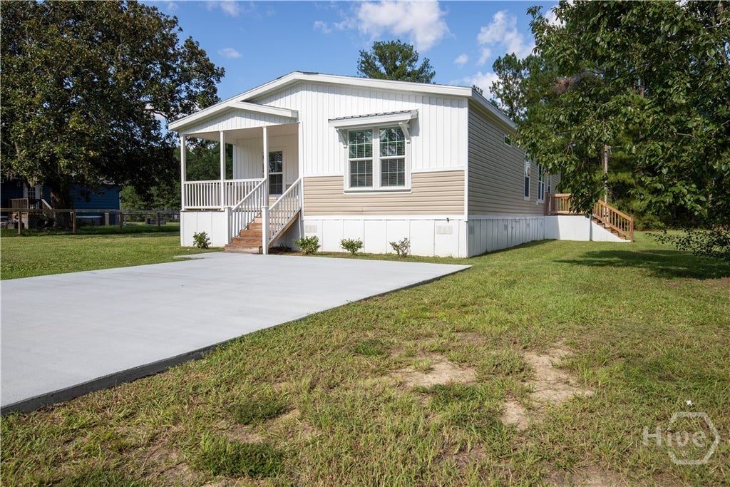Photo of 660 N Macon Street, Ludowici, GA 31313 (MLS # SA365044)