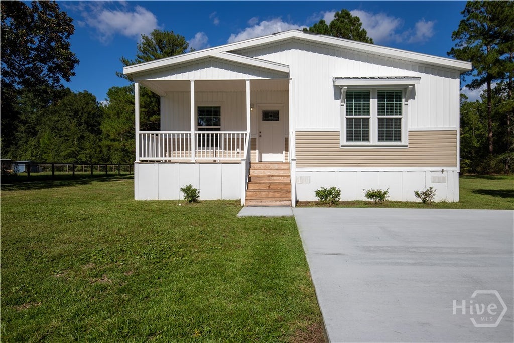Photo of 660 N Macon Street, Ludowici, GA 31313 (MLS # SA365044)
