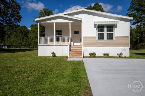 Photo of 660 N Macon Street, Ludowici, GA 31313 (MLS # SA365044)