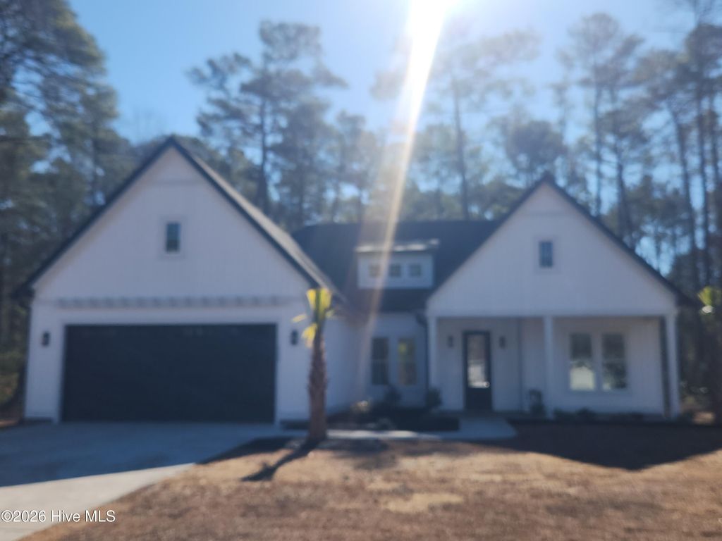 Photo of 532 Briarwood Drive NW, Calabash, NC 28467 (MLS # 100554103)