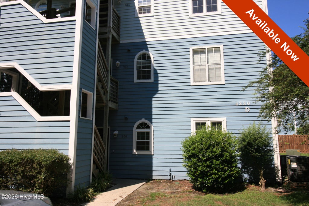 Photo of 4230 Wilshire Boulevard #Apt 106, Wilmington, NC 28403 (MLS # 100599631)