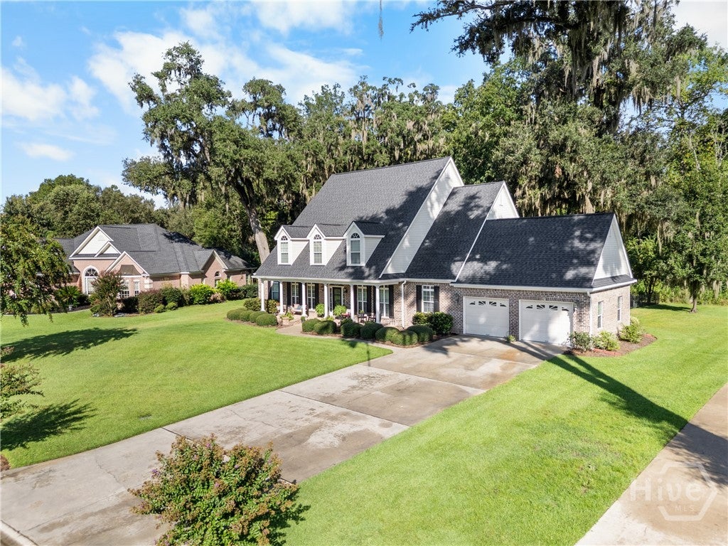 Photo of 240 Windsong Drive, Richmond Hill, GA 31324 (MLS # SA364240)