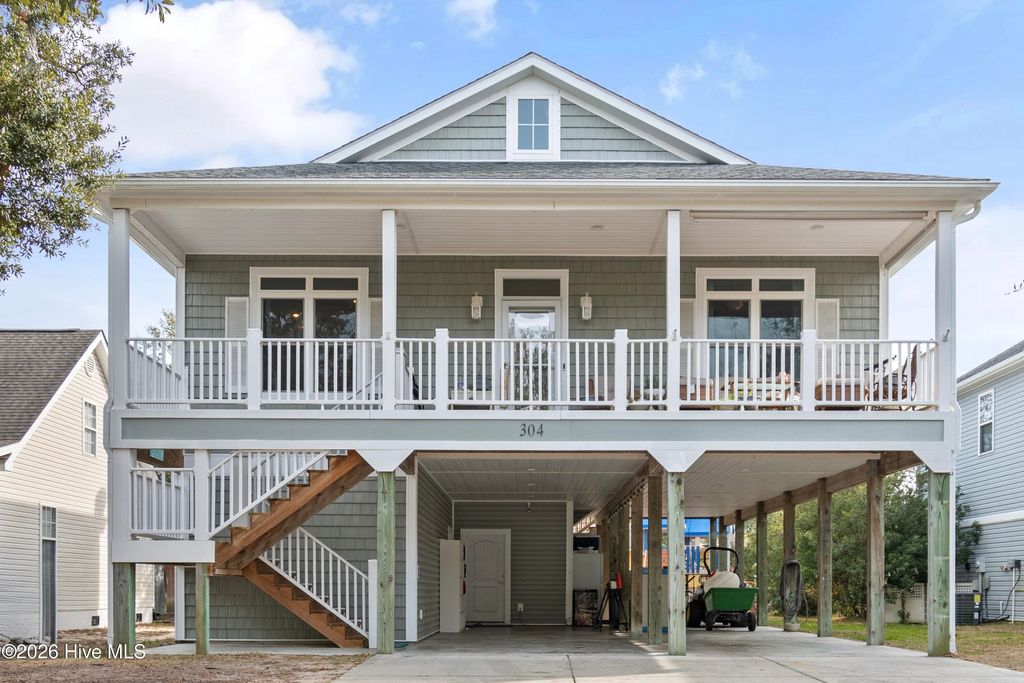 Photo of 304 NE 47th Street, Oak Island, NC 28465 (MLS # 100546132)