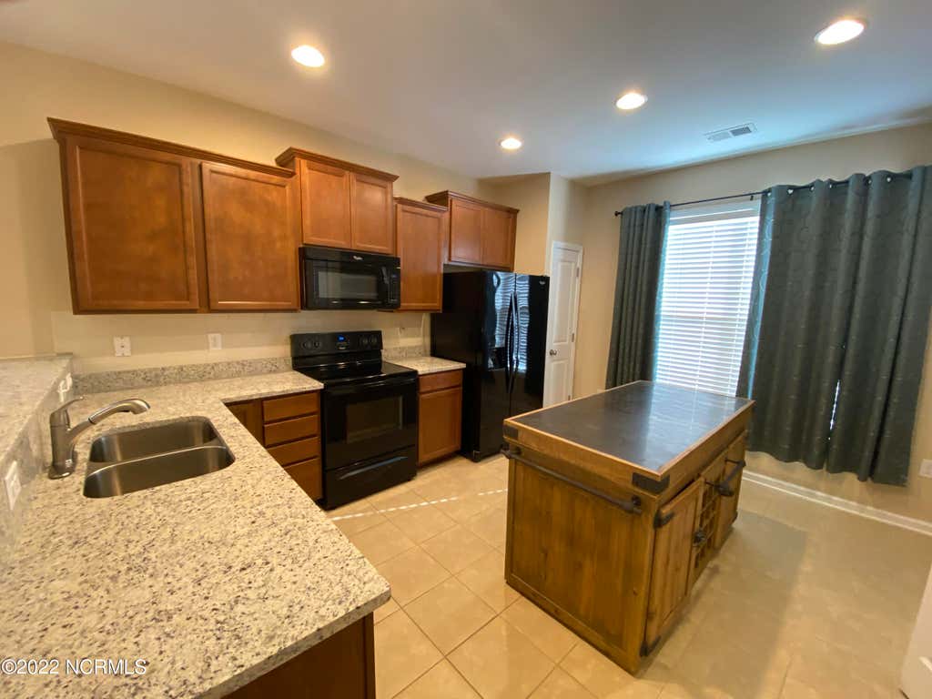 Photo of 314 Bulkhead Bend, Carolina Shores, NC 28467 (MLS # 100588621)