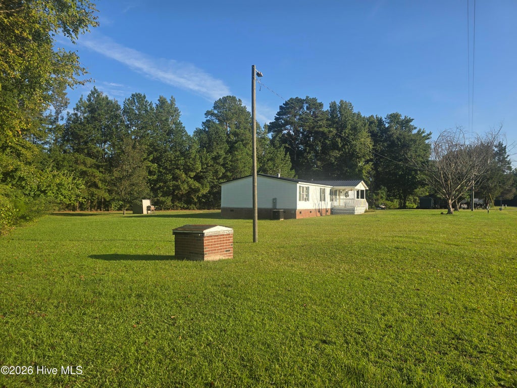 Photo of 416 Grimes Singletary Road, Tar Heel, NC 28392 (MLS # 100606532)