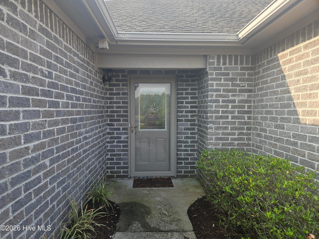 Photo of 502 Castle Bay Drive #D, Hampstead, NC 28443 (MLS # 100603865)