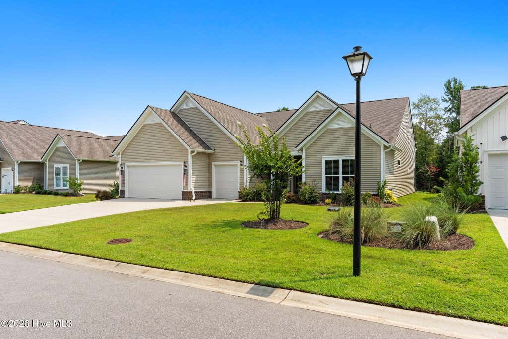 Photo of 73 Eagle Claw Drive, Carolina Shores, NC 28467 (MLS # 100592623)