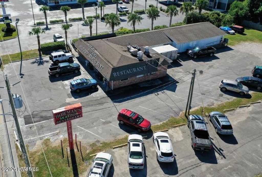 Photo of 911 N Lake Park Boulevard N, Carolina Beach, NC 28428 (MLS # 100556429)