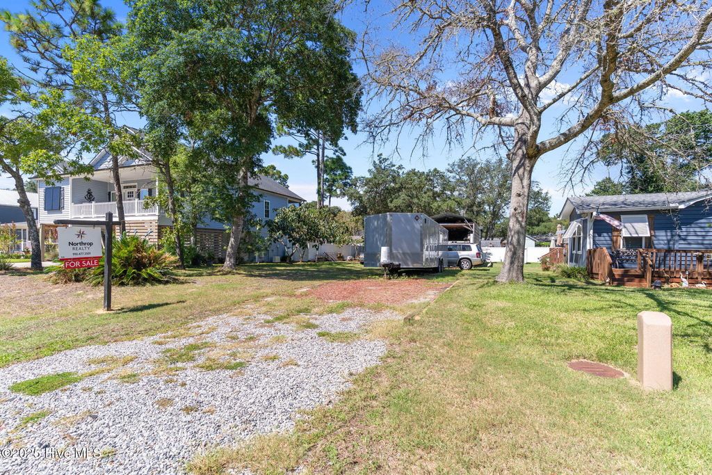 Photo of 209 NE 55th Street, Oak Island, NC 28465 (MLS # 100527493)