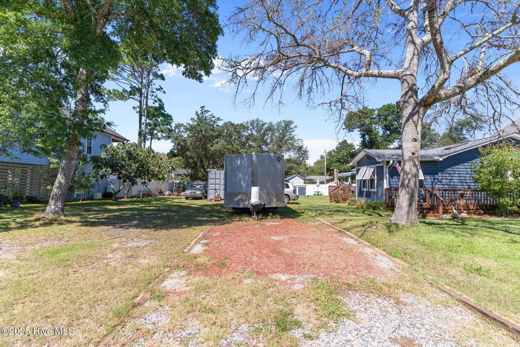 Photo of 209 NE 55th Street, Oak Island, NC 28465 (MLS # 100527493)