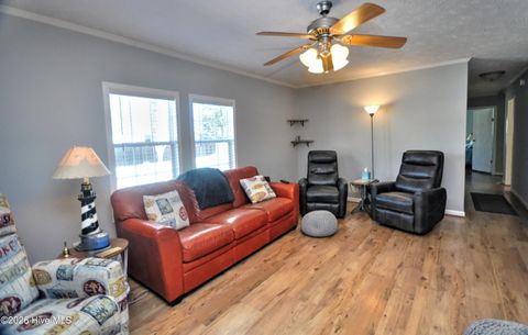 Tiny photo for 166 NE 5th Street, Oak Island, NC 28465 (MLS # 100550740)