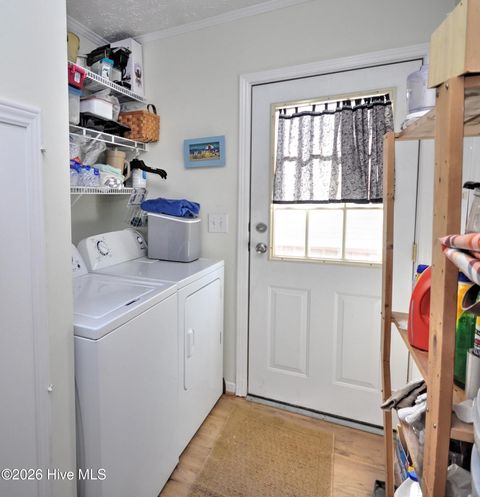 Tiny photo for 166 NE 5th Street, Oak Island, NC 28465 (MLS # 100550740)