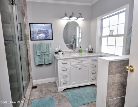 Tiny photo for 166 NE 5th Street, Oak Island, NC 28465 (MLS # 100550740)