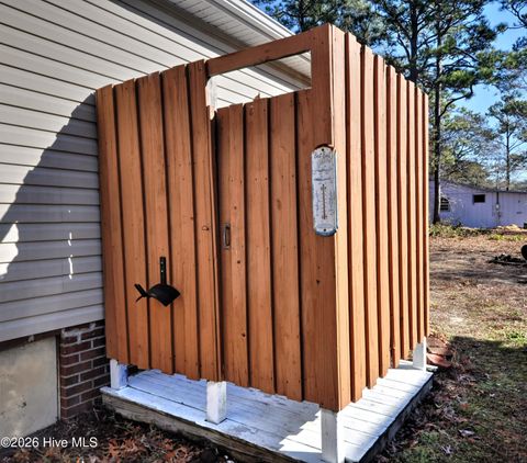 Tiny photo for 166 NE 5th Street, Oak Island, NC 28465 (MLS # 100550740)