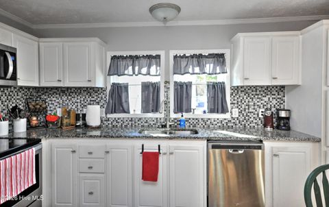 Tiny photo for 166 NE 5th Street, Oak Island, NC 28465 (MLS # 100550740)