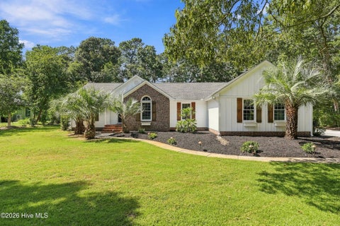 Photo of 613 Ravenswood Road, Hampstead, NC 28443 (MLS # 100604245)