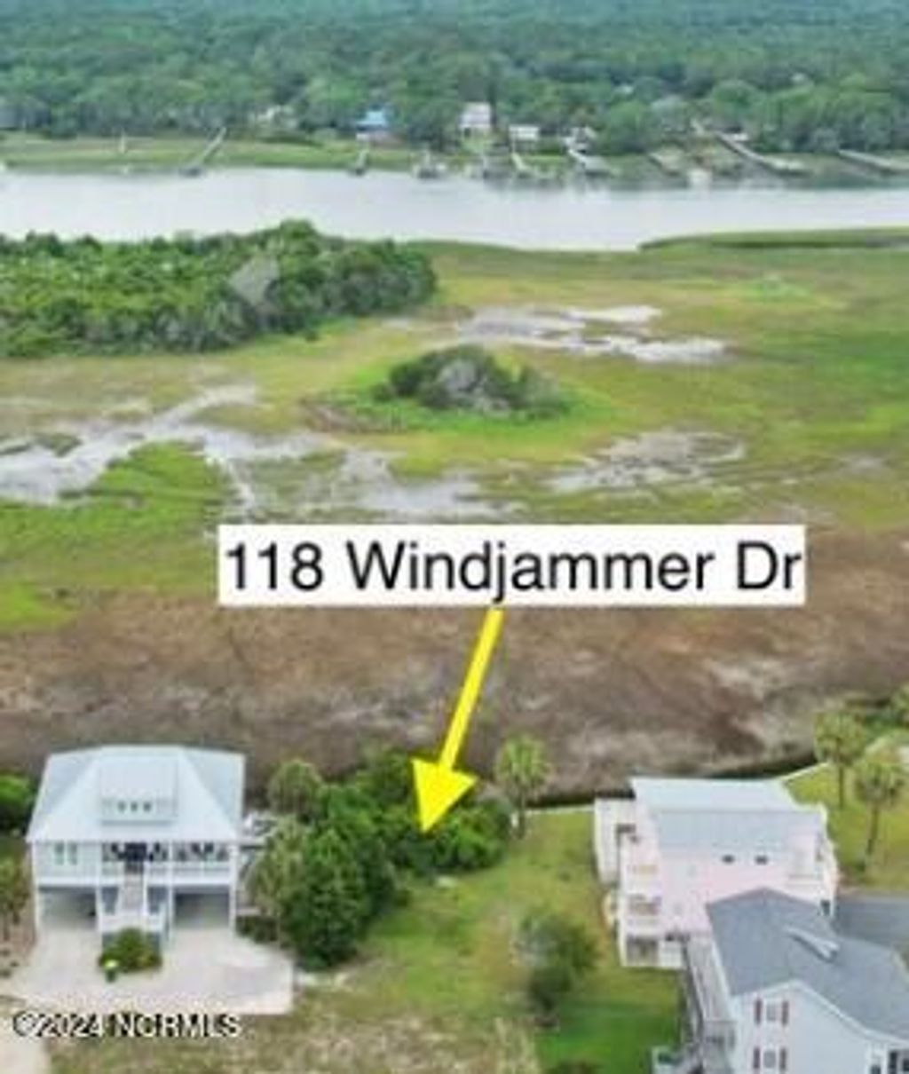 Photo of 118 Windjammer Drive, Holden Beach, NC 28462 (MLS # 100387430)